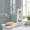 Woman using Dove Shampoo Hairfall Rescue 170ml for healthy smooth hair