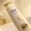 Dove Nourishing Oil Care Shampoo 170ml angled bottle view on soft background