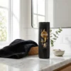 Woman using Sunsilk Stunning Black Shine Shampoo 170ml in bathroom